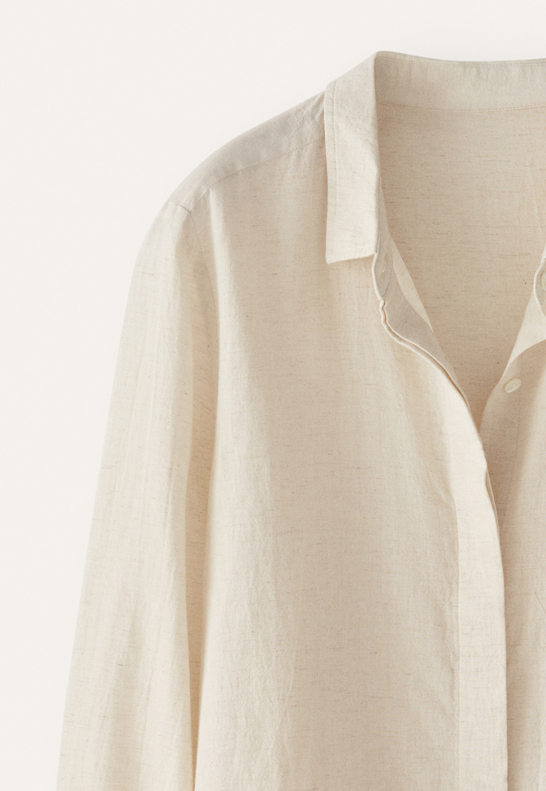 Bluse mit geschwungenem Saum