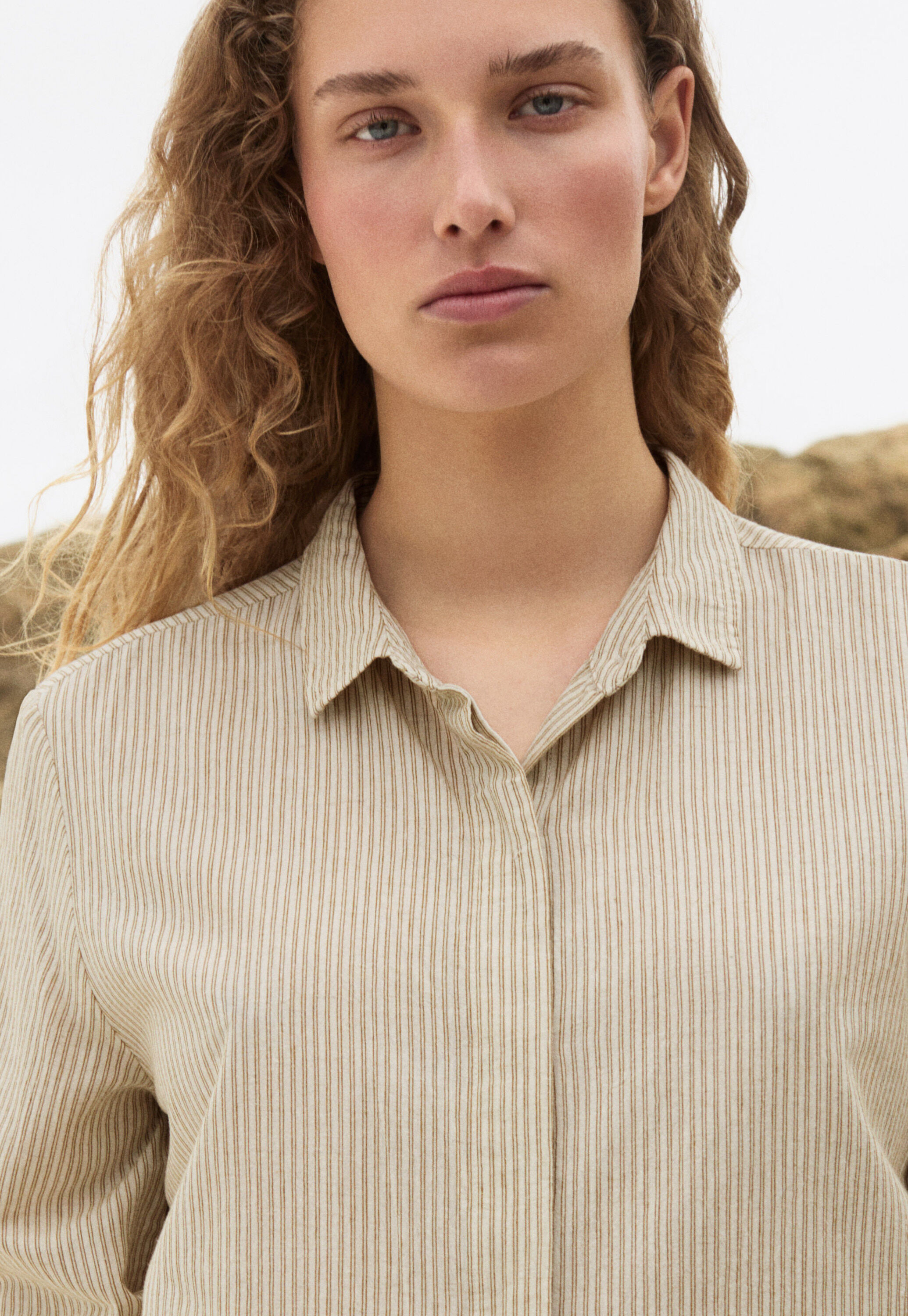 Bluse mit geschwungenem Saum
