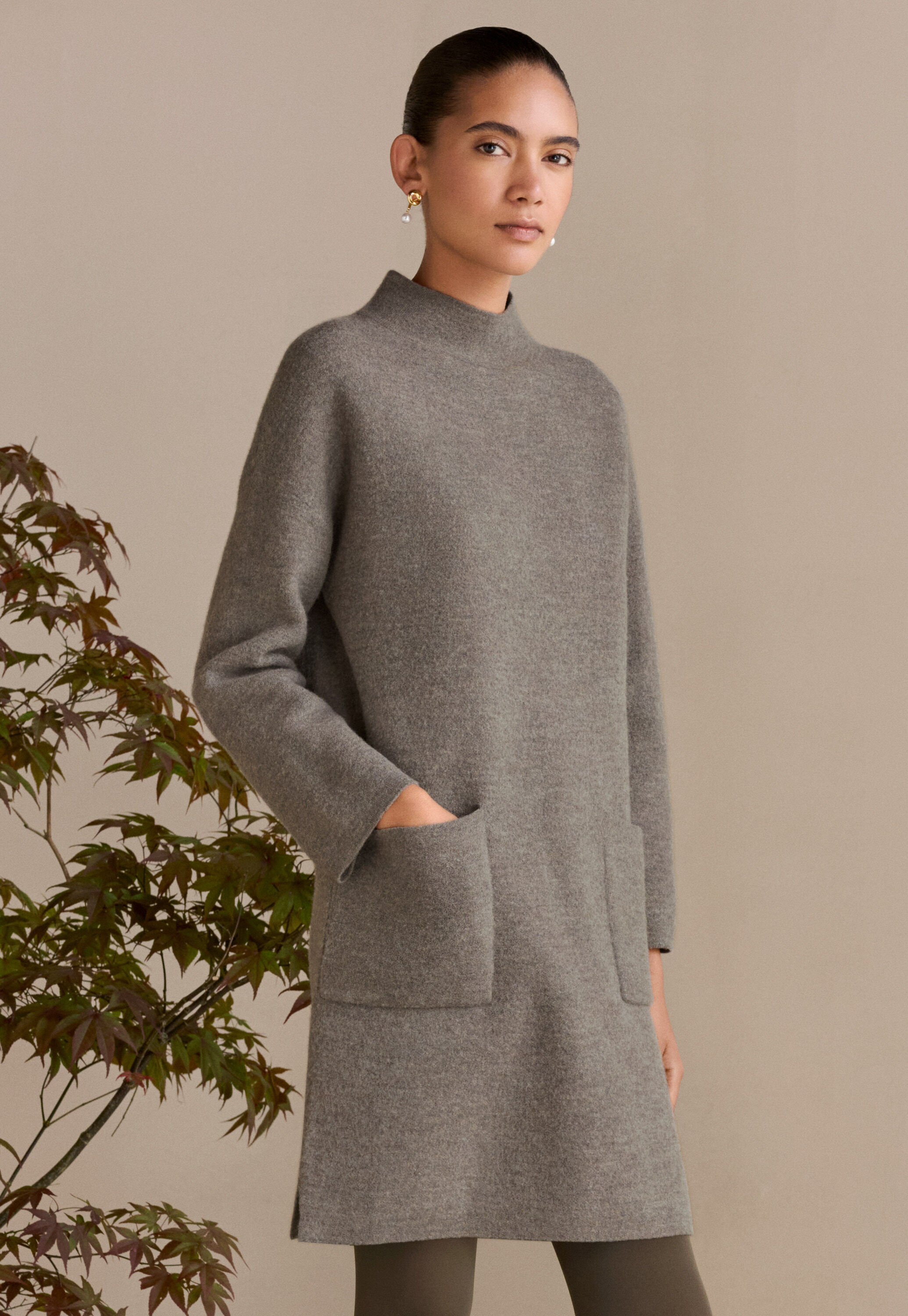 Kleid mit aufgesetzten Taschen