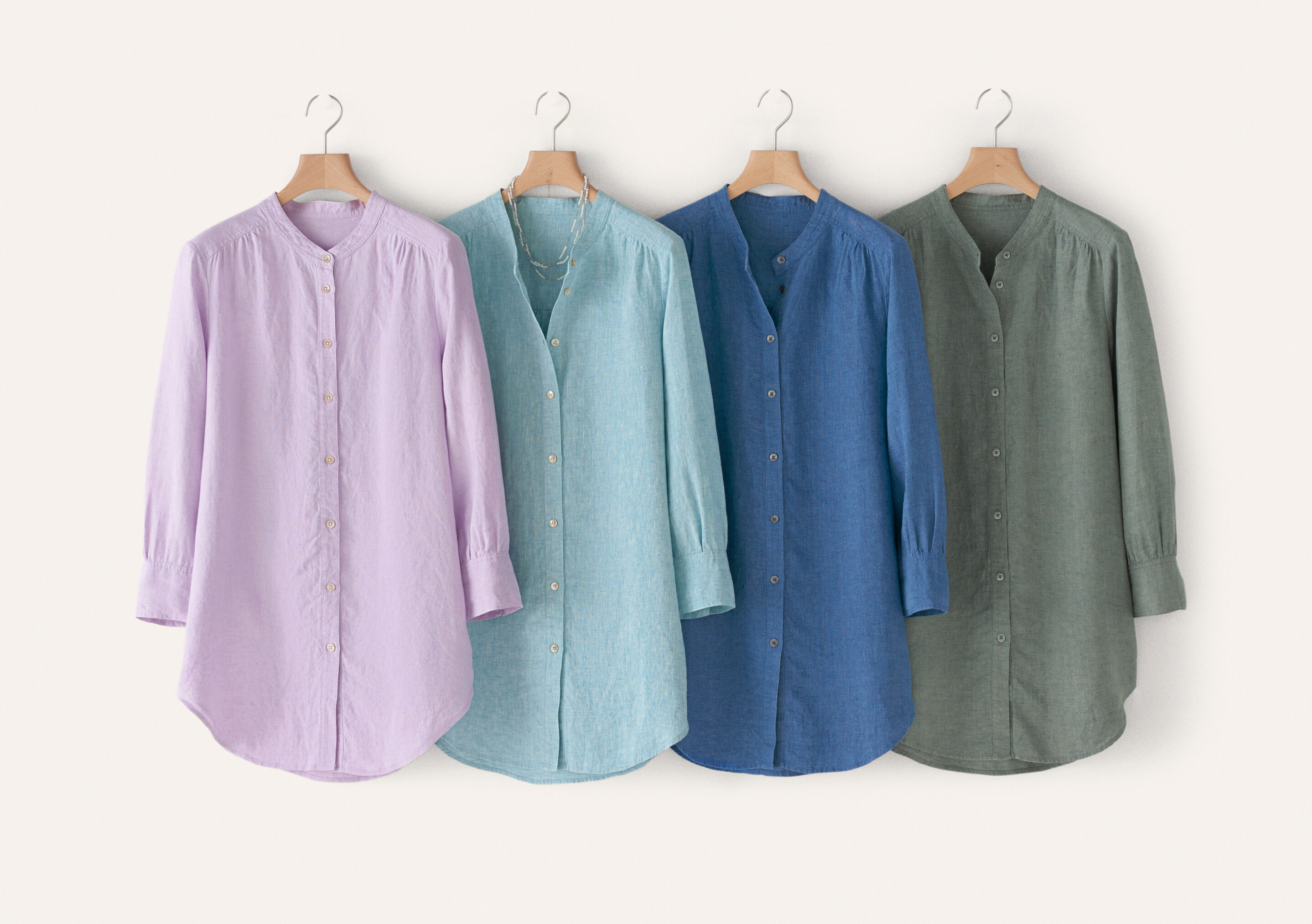Lange Bluse mit geschwungenem Saum